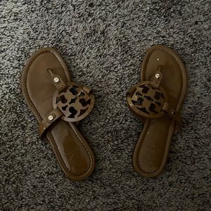 Tan colored tory burches